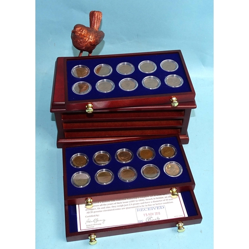 344 - The Danbury Mint 'British Coins of World War II', contained in an eight-drawer display chest, with c... 