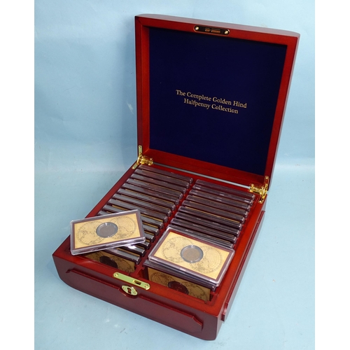 344 - The Danbury Mint 'British Coins of World War II', contained in an eight-drawer display chest, with c... 