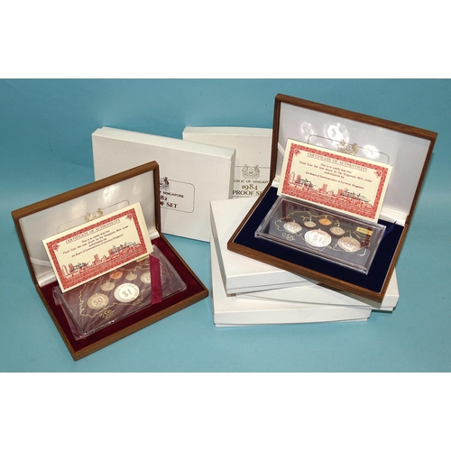 349 - Singapore, five cased proof coin sets for 1982 (x2), 1983 (x2) and 1984, in original packaging, (5).... 