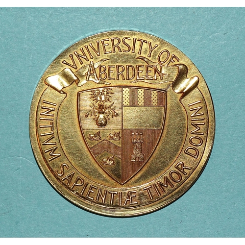 389 - David Rennet LL.D Gold Medal, 4.5cm diameter, 48.9g, the obverse featuring the coat and arms of Univ... 