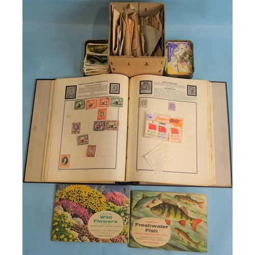 42 - The Meteor stamp album, with British and world stamps, loose stamps, tea cards and other ephemera.... 