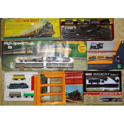 469 - OO gauge, a Trix Twin Cadet Railway set, (boxed), a Hornby R693 High Speed Train set, (boxed), (both... 