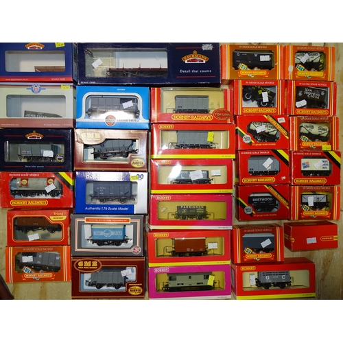 549 - A quantity of OO gauge boxed wagons, mainly Hornby, (31).