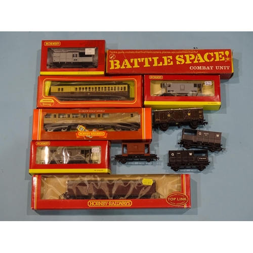 588 - Hornby OO gauge, two coaches: R333 and R478, four wagons: R6146, R6054, R6296A and R6694, a Triang B... 