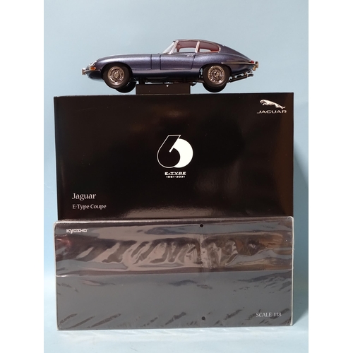 620 - Kyosho, two 1:18 Jaguar E-Type diecast models, both dark blue metallic, mint, (boxed), (2).... 