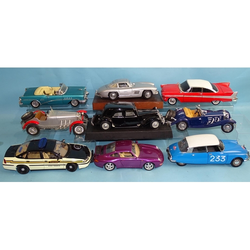 649 - Fourteen unboxed diecast scale model cars, mainly 1:18 Maisto and Burago, (14).