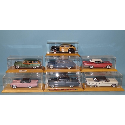 653 - Danbury Mint, seven classic 1940's/50's cars in display cases with wooden plinths, (no boxes), (7).... 