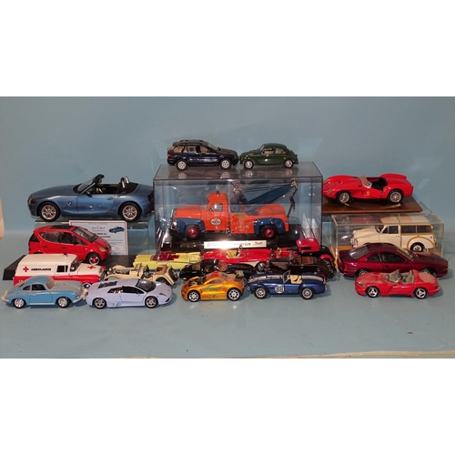 655 - A Road Signature Ford 1953 F-100 Wrecker in display case and other diecast vehicles, (20).... 