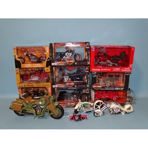 662 - Eight boxed motorcycles by Maisto (4) and Newray (4), a Maisto Harley Davidson Fire Dept Ford pickup... 