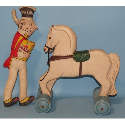 673 - An Art Deco-style pull-along painted wood horse and a 