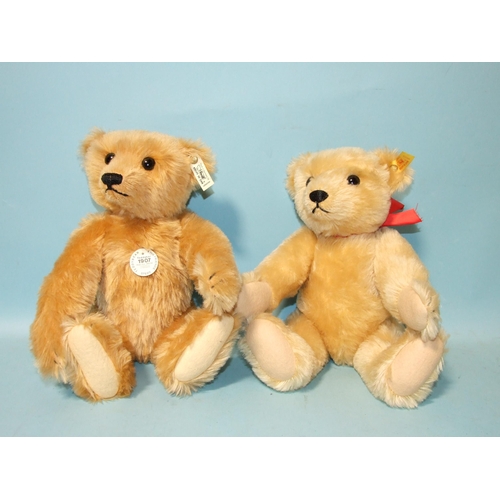 690 - A Steiff 1907 replica teddy bear with ear tag and label and a similar Steiff teddy bear with ear tag... 