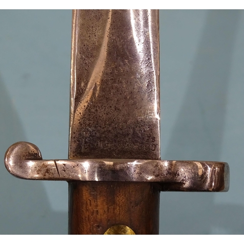 706 - A Belgian 1876 pattern sword bayonet with bronze and iron fittings and wood grips, the single-edge 5... 