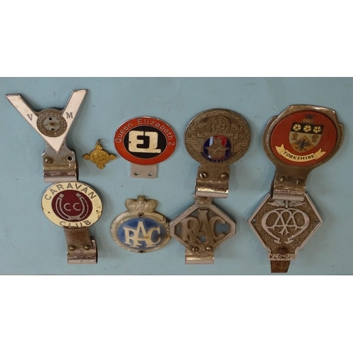 709 - A collection of eight car badges, including 'AA' no.V277890, 'Yorkshire', 'Royal Air Force', 2x 'RAC... 