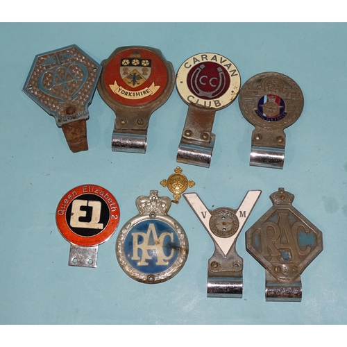 709 - A collection of eight car badges, including 'AA' no.V277890, 'Yorkshire', 'Royal Air Force', 2x 'RAC... 