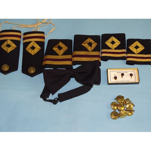 718 - A Royal Fleet Auxiliary Merchant Navy uniform jacket, hat, three pairs of epaulettes, buttons, etc.... 