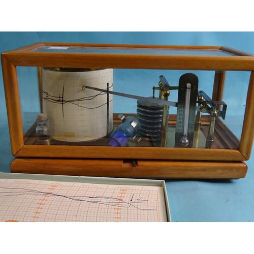 724 - A French barograph, in wooden case with glazed panels, stamped Brevetes R.F. Paris, no.1727, 30cm wi... 