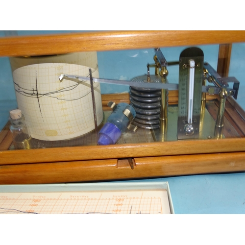 724 - A French barograph, in wooden case with glazed panels, stamped Brevetes R.F. Paris, no.1727, 30cm wi... 