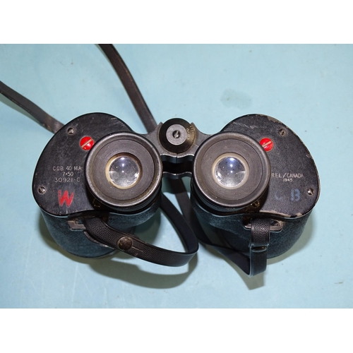 726 - A pair of Canadian binoculars marked REL/Canada 1945 C.G.B. 40 MA 7x50 30921-C, red 'W', blue CB, in... 