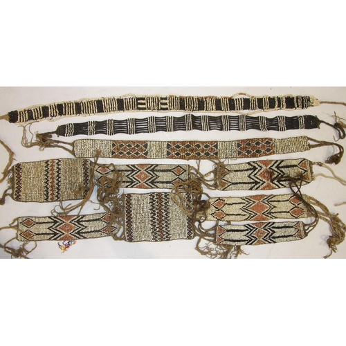 740 - A collection of Oceanic tribal beadwork, belts and arm and wrist adornments.