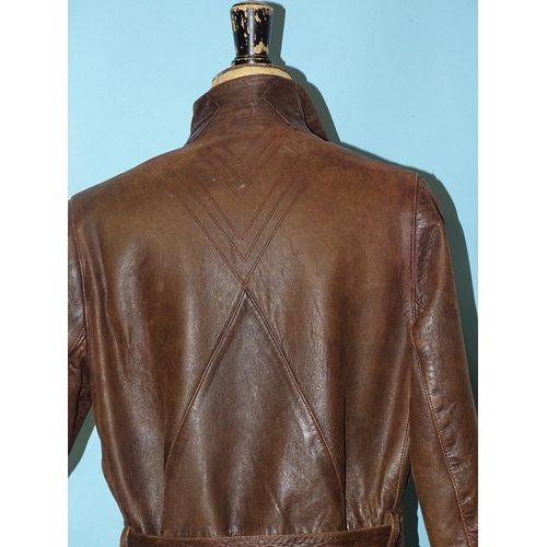 745 - A vintage lady's tan soft leather coat used for motorcycling, with stand-up collar and parallel-stit... 