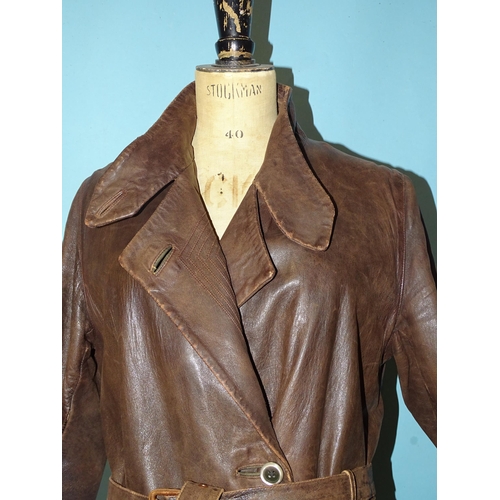 745 - A vintage lady's tan soft leather coat used for motorcycling, with stand-up collar and parallel-stit... 