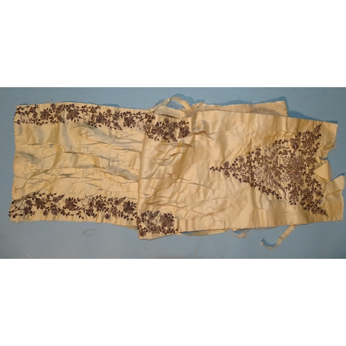 746 - A silk taffeta skirt panel of tapered form, embroidered with gold bugle beads and simulated pearls, ... 