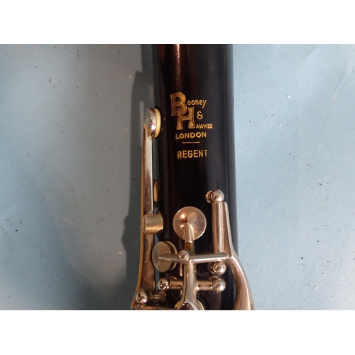 751 - A Boosey & Hawkes Regent clarinet, 26½'' approximately, no. 296360, in fitted case, with clarine... 