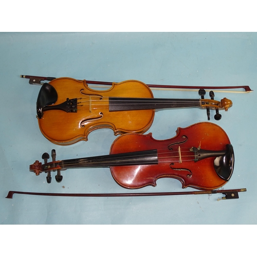 757 - A Russian 3/4-size violin with Chinese bow, in case and another copy Stradivarius 3/4-size violin wi... 