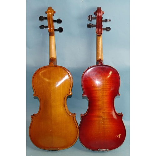 757 - A Russian 3/4-size violin with Chinese bow, in case and another copy Stradivarius 3/4-size violin wi... 