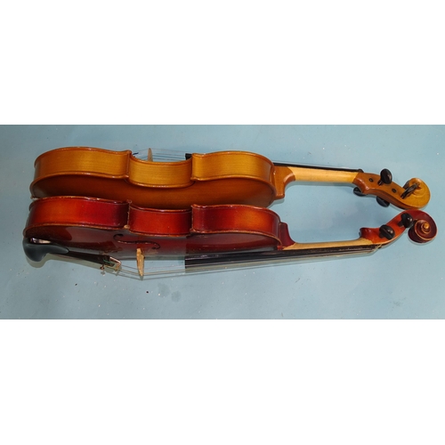 757 - A Russian 3/4-size violin with Chinese bow, in case and another copy Stradivarius 3/4-size violin wi... 