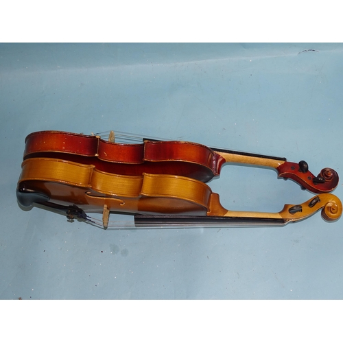 757 - A Russian 3/4-size violin with Chinese bow, in case and another copy Stradivarius 3/4-size violin wi... 