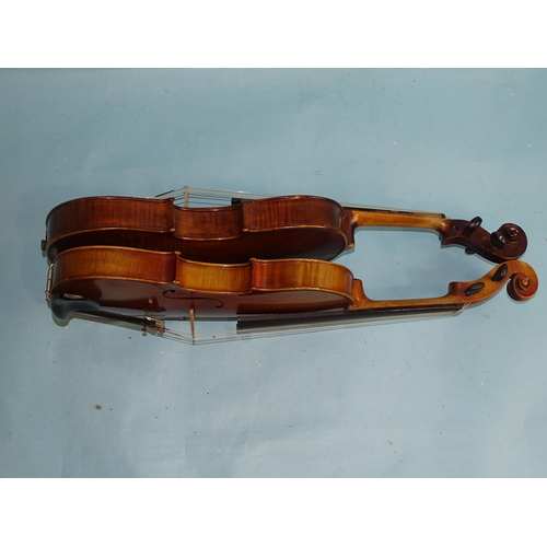 758 - A full-size violin copy of Nicholas Amati, with two-piece back and two replacement pegs, with bow, i... 