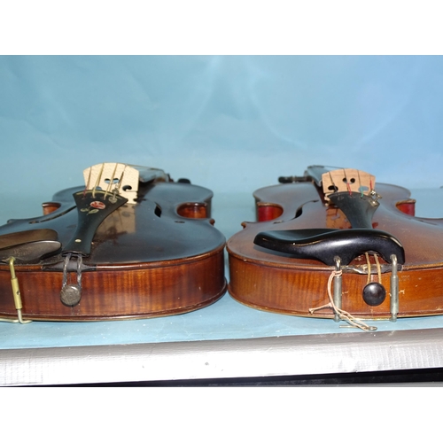 758 - A full-size violin copy of Nicholas Amati, with two-piece back and two replacement pegs, with bow, i... 