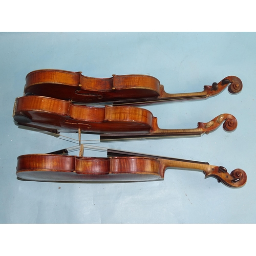 760 - A full-size violin labelled Antonius Stradivarius, with two-piece back and replacement tuning pegs, ... 