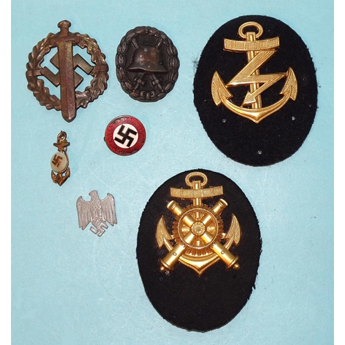 788 - A German SA sports badge (pin lacking), a German wound badge, a WWII German Kriegsmarine Engineer ar... 