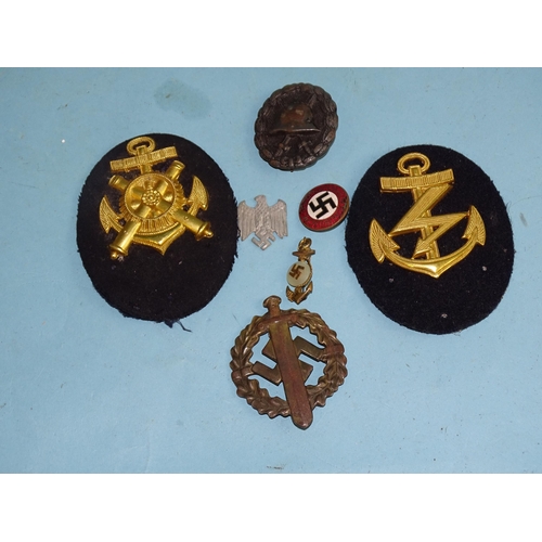 788 - A German SA sports badge (pin lacking), a German wound badge, a WWII German Kriegsmarine Engineer ar... 