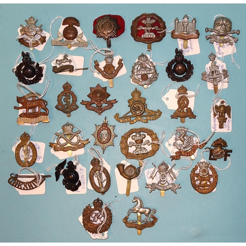 790 - A collection of thirty-two various military badges.