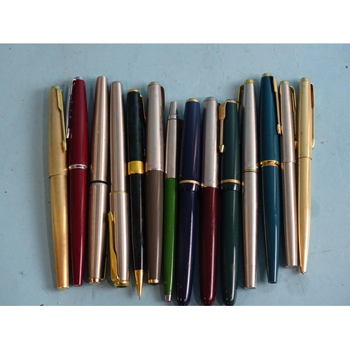 802 - A collection of nine Parker fountain pens, including 'Junior', 'Victory', '45', two ballpoint pens a... 