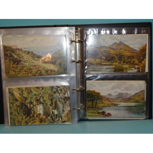 91 - An album of 100 artist-drawn A R Quinton postcards, mainly Southern England.