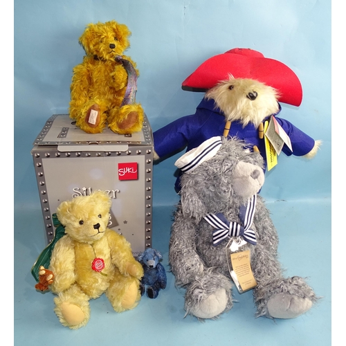 692 - A Rainbow Designs Paddington Bear, a boxed silver tag teddy bear and three others by Hermann Deans R... 