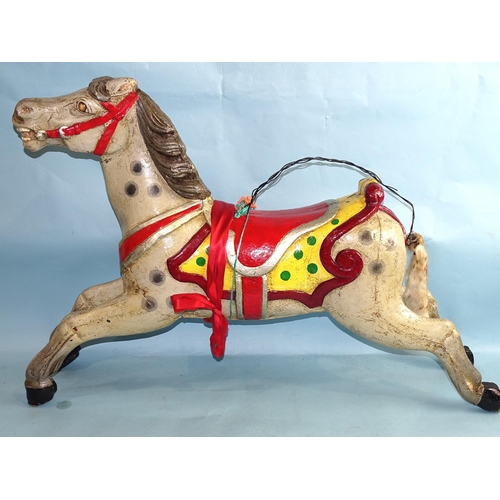 698 - A painted fibreglass carousel horse, 66cm high, 94cm long.