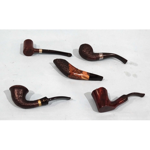 779 - A Peterson's 'Donegal' silver-mounted pipe, a 'Big Ben Freestyle' briar pipe, a Peterson's 'Tankard'... 