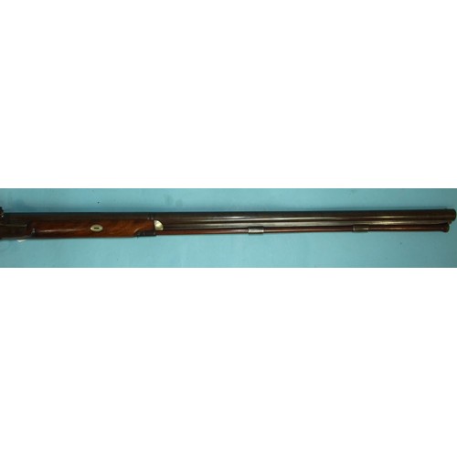 704 - A 19th century twelve-bore percussion fowling piece, with 79cm two-stage Damascus barrel in walnut s... 