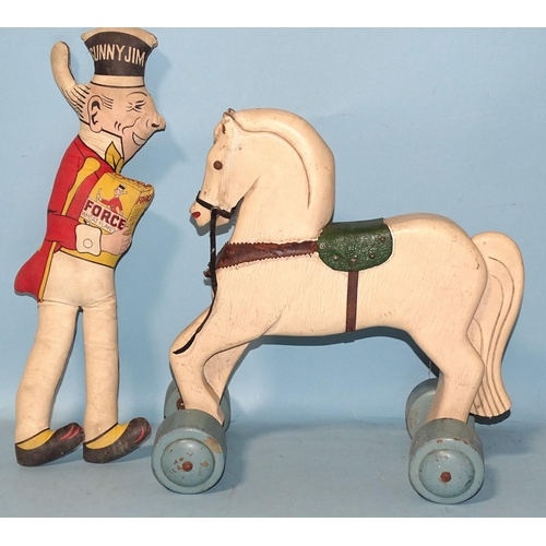 81 - An Art Deco-style pull-along painted wood horse and a 