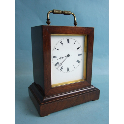 121 - An early-19th century rosewood small mantel clock of rectangular shape, with white enamel dial and b... 