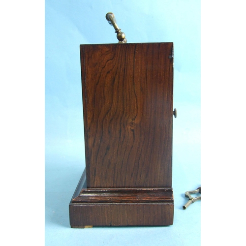 121 - An early-19th century rosewood small mantel clock of rectangular shape, with white enamel dial and b... 