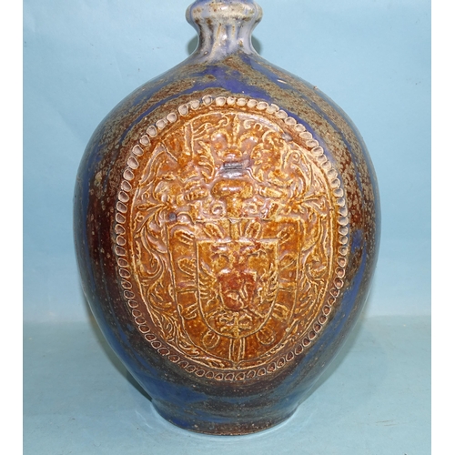 123 - A German salt-glazed baluster wine flagon with state coat of arms, on blue, brown and white mottled ... 