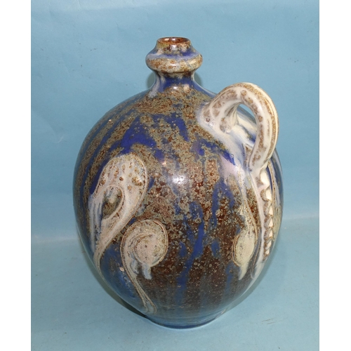 123 - A German salt-glazed baluster wine flagon with state coat of arms, on blue, brown and white mottled ... 