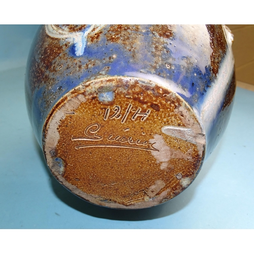 123 - A German salt-glazed baluster wine flagon with state coat of arms, on blue, brown and white mottled ... 