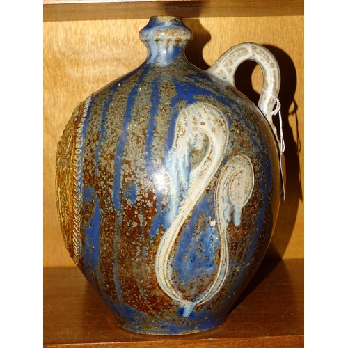 123 - A German salt-glazed baluster wine flagon with state coat of arms, on blue, brown and white mottled ... 